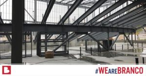 metal frame structure with the words hashtag #wearebranco